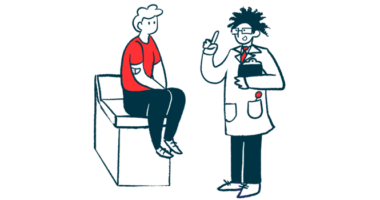 A doctor talks to a patient sitting on an examination table.