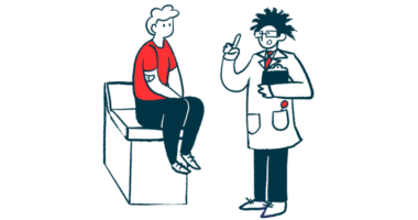 A doctor consults with a patient in an examining room.