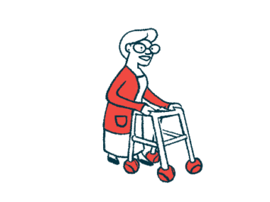 An elderly woman uses a walker as a mobility aid.