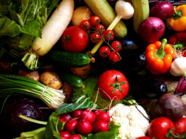 fruits and vegetables such as tomatoes, peppers, cauliflower, and bananas