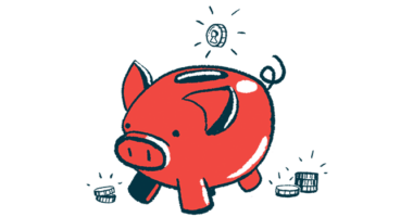 A coin is seen dropping into the top slot of a pig-shaped bank.