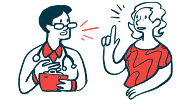 A patient gestures with one hand while talking with a clinician, who holds a clipboard.