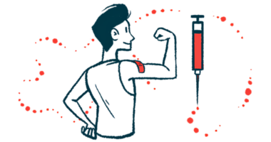 A person holds his arm up to show his success in administering a subcutaneous injection.