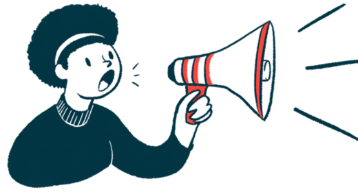 A woman speaks using a megaphone.