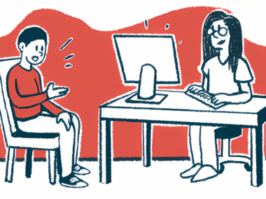 A patient speaks with a clinician who enters data into a computer.