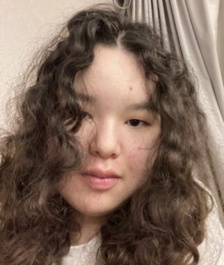 A close-up image of a young woman.