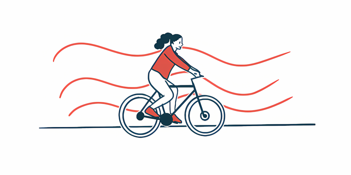 An illustration of a female exercising by riding a bike.