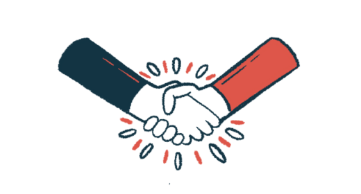 A pair of hands engage in a handshake.